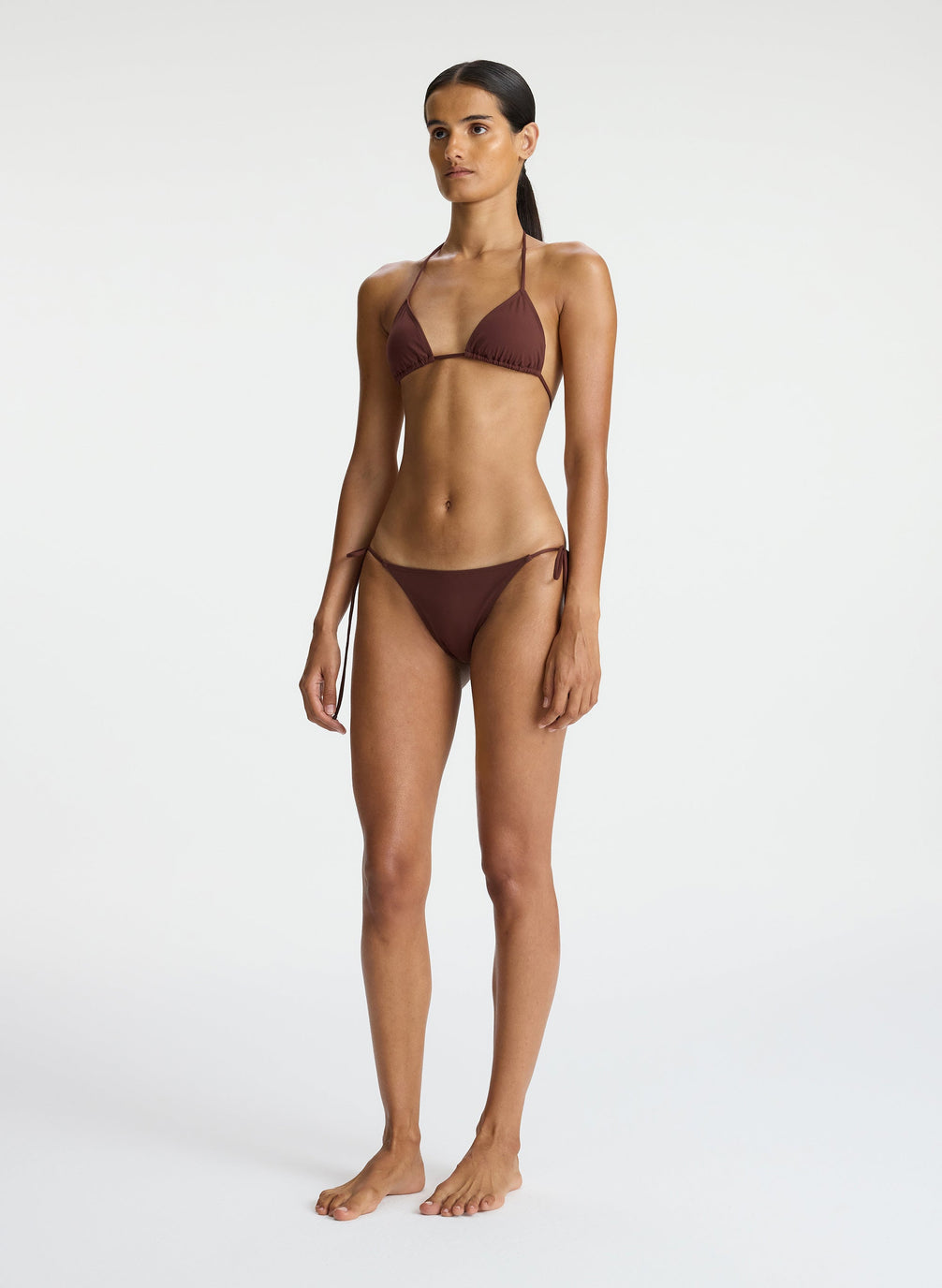 side  view of woman wearing brown bikini set