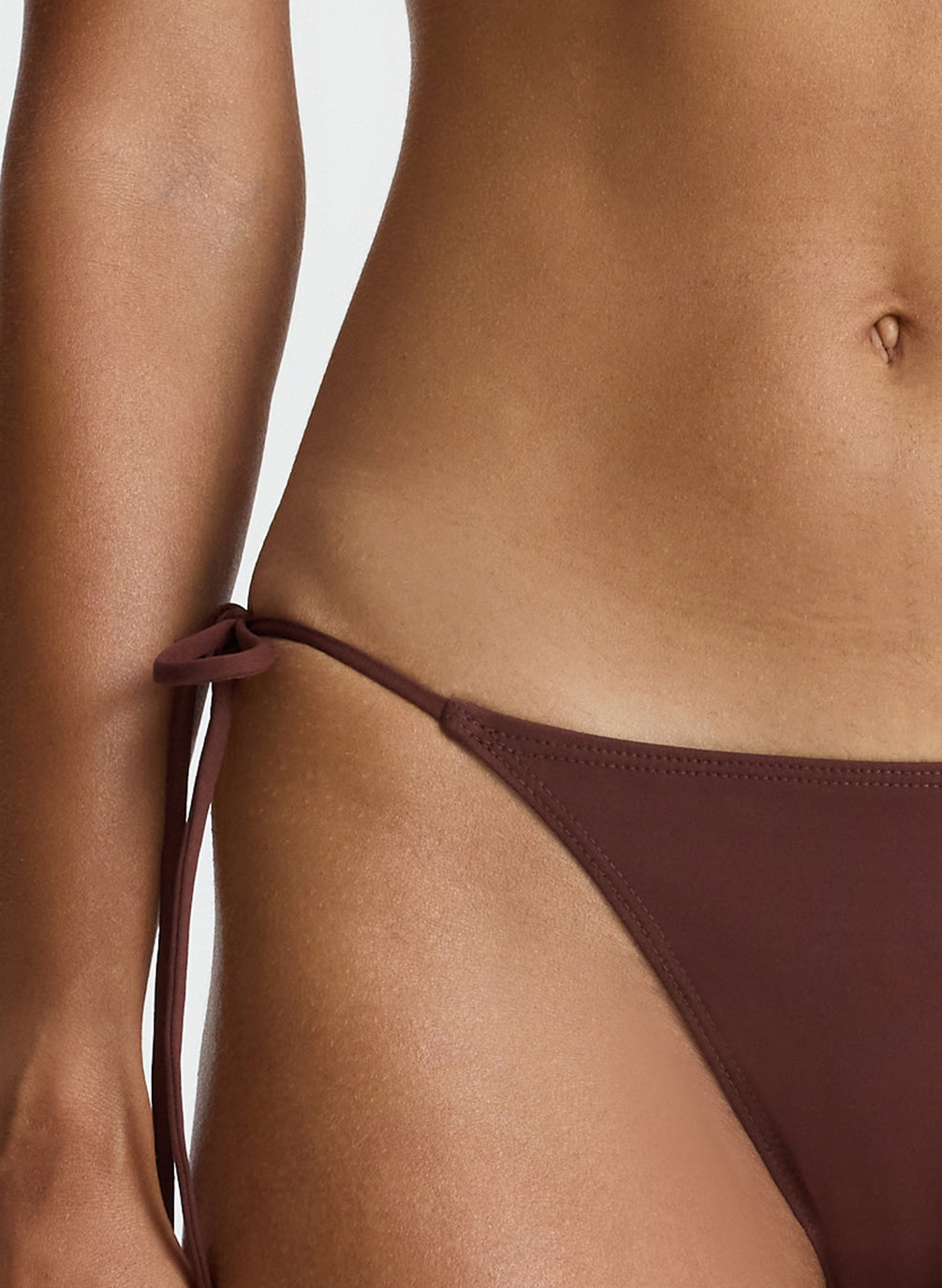 detail  view of woman wearing brown bikini set