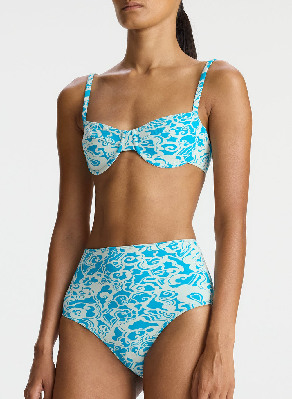 detail view of woman wearing aqua print bikini set