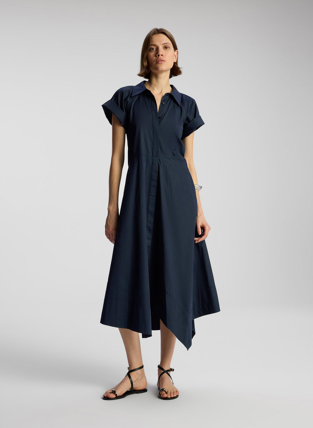 front view of woman wearing navy blue midi shirtdress