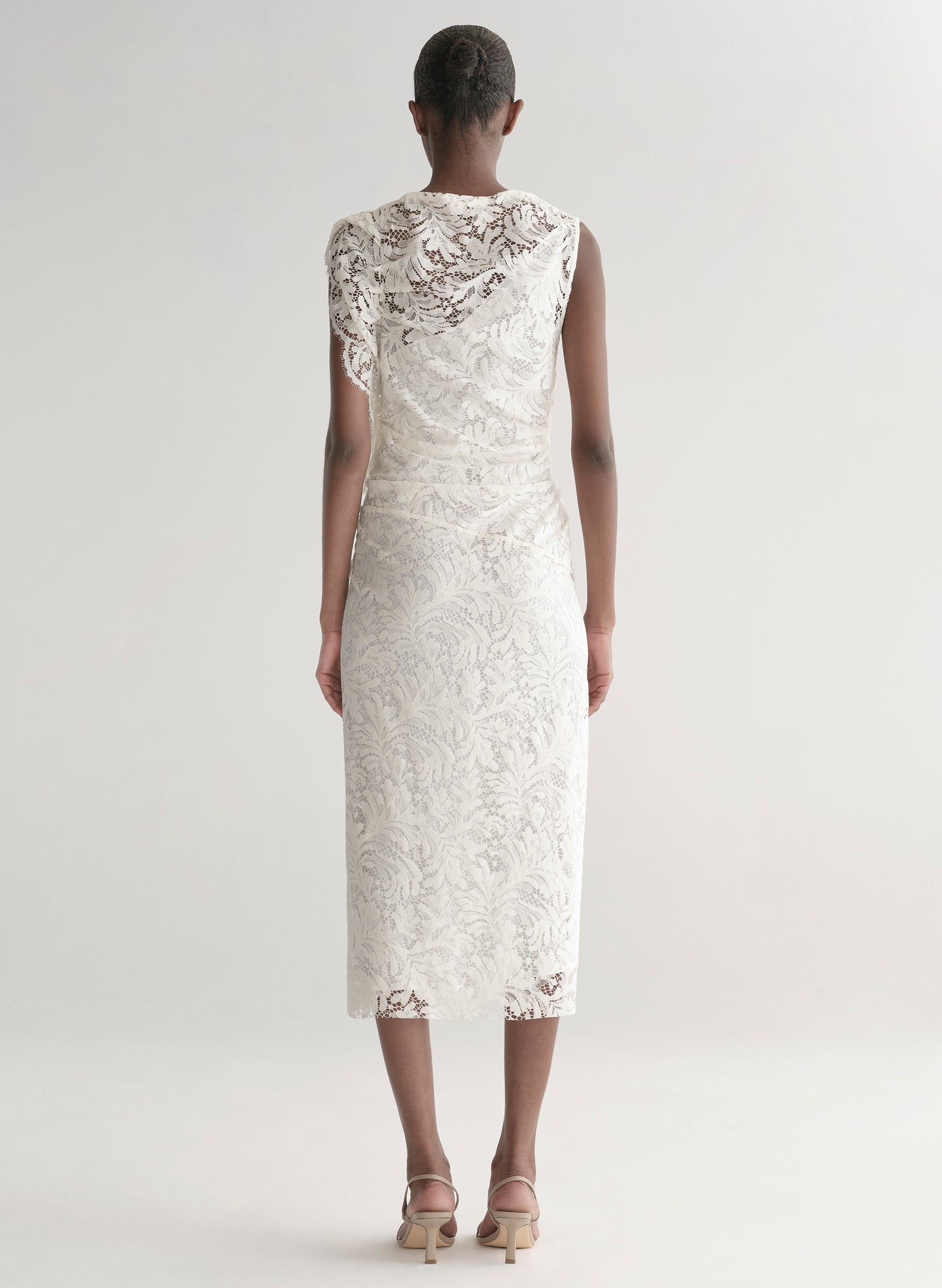 woman wearing white lace dress