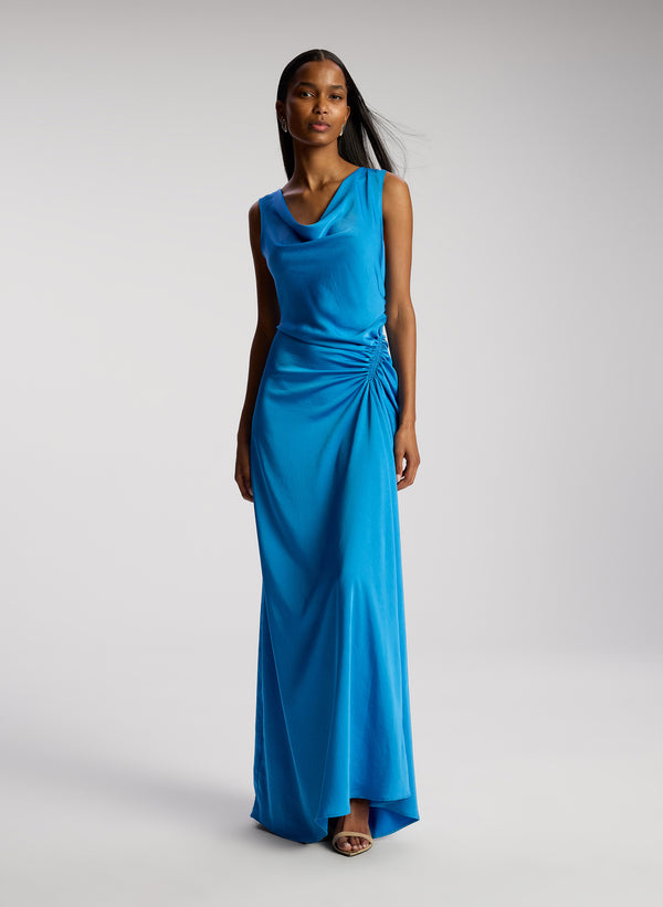 front view of woman wearing blue satin maxi dress