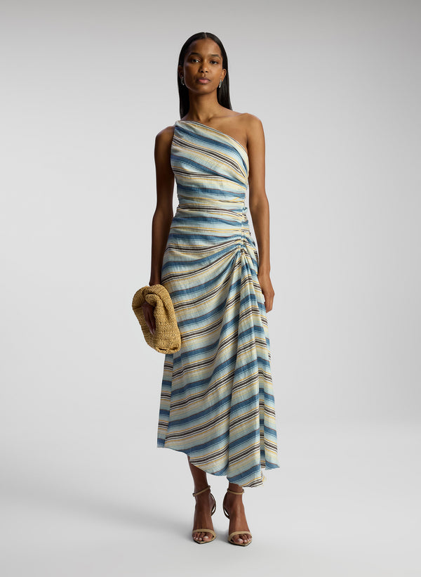 front view of woman wearing one shoulder striped midi dress