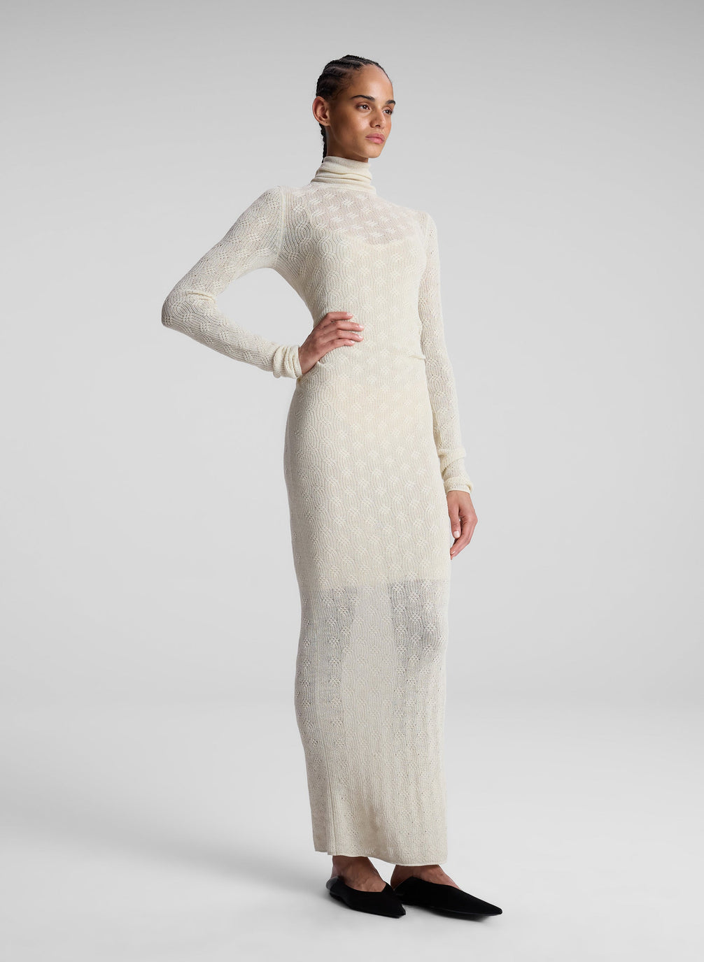 woman wearing cream alpaca sweater dress