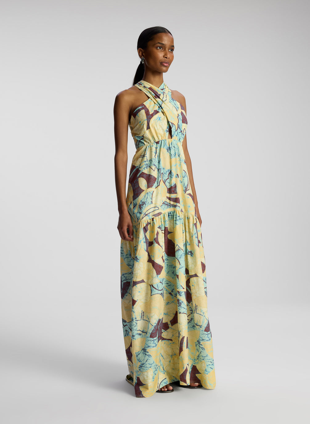side view of woman wearing printed maxi dress