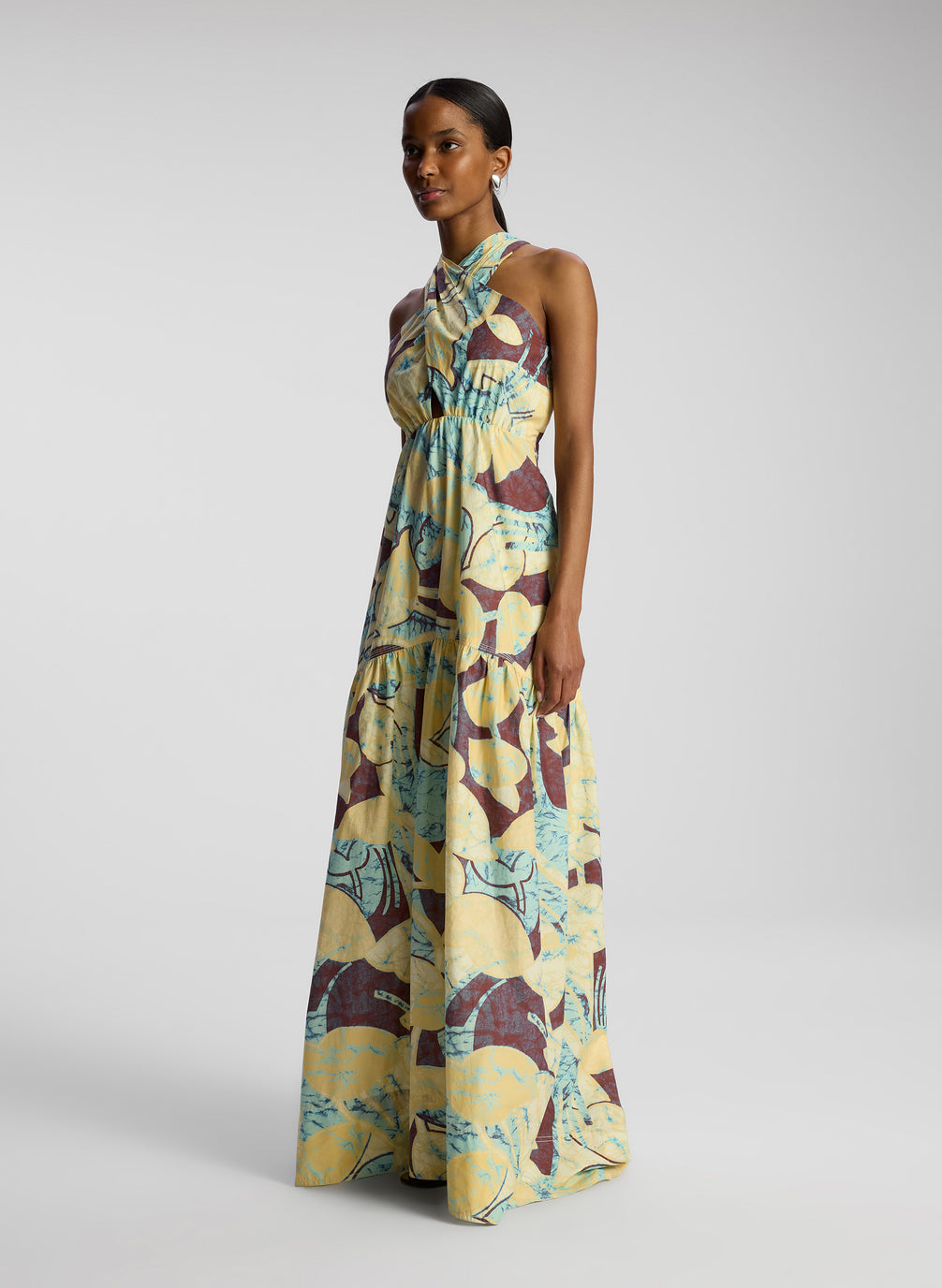 side view of woman wearing printed maxi dress