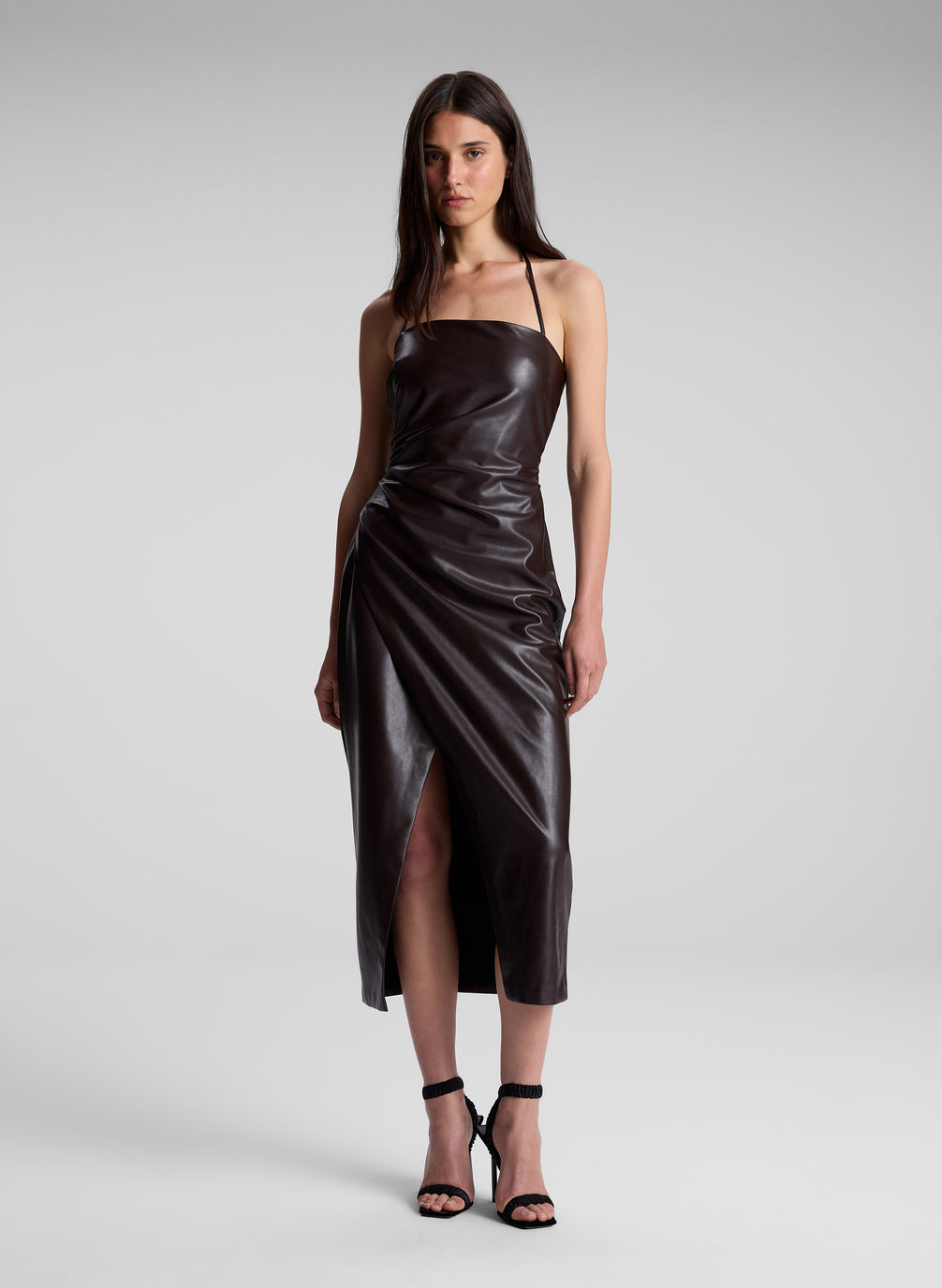 woman wearing brown faux leather midi dress