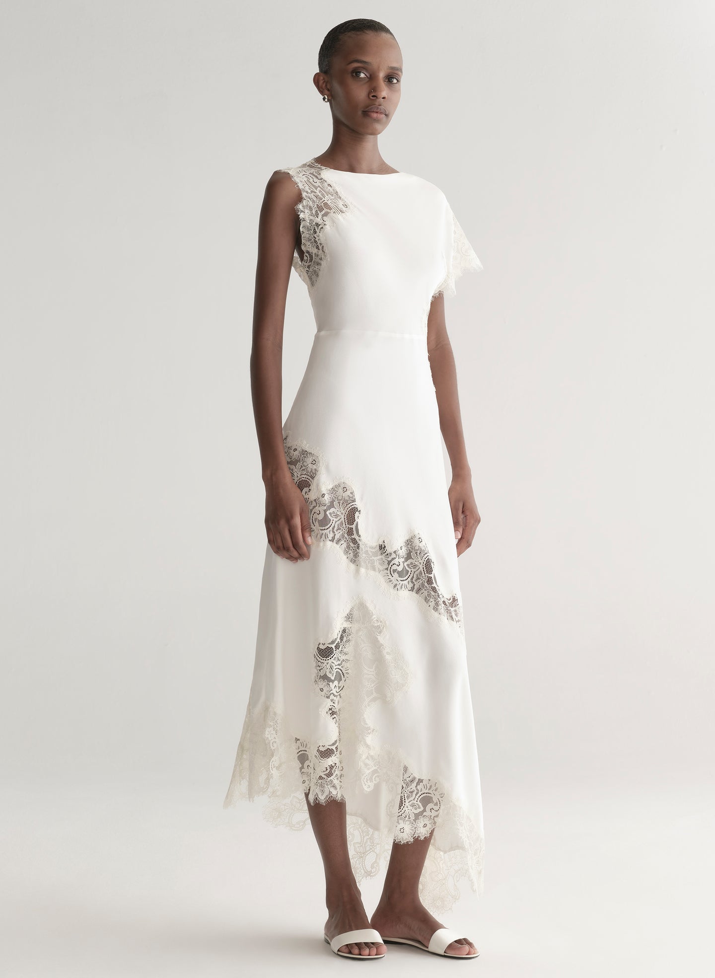 woman wearing white satin and lace dress