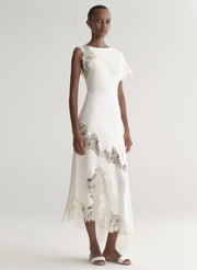 woman wearing white satin and lace dress