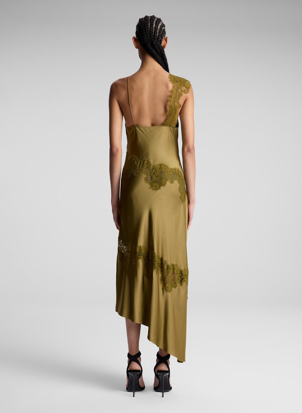 woman wearing olive green slip dress