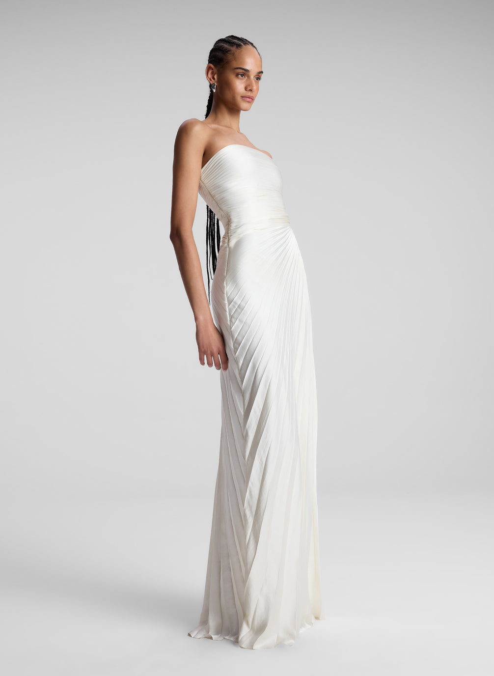 Woman Wearing White Strapless Pleated Maxi Dress