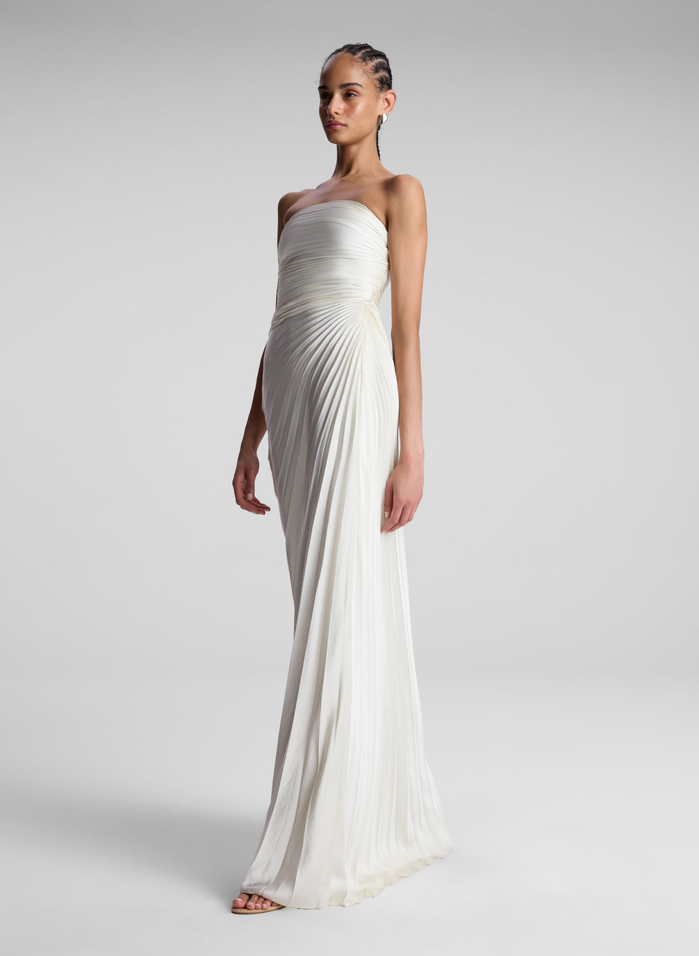 Woman Wearing White Strapless Pleated Maxi Dress