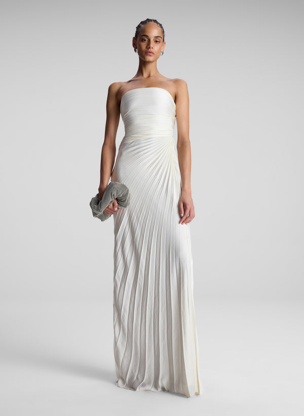 Woman Wearing White Strapless Pleated Maxi Dress