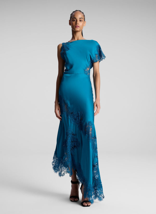 woman wearing teal lace maxi dress