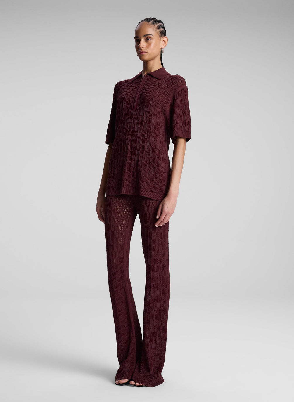 woman wearing burgundy knit pant and shirt set