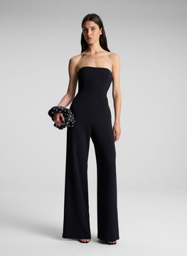 woman wearing black strapless jumpsuit