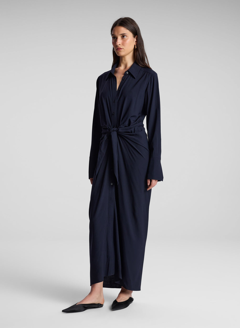 woman wearing navy blue maxi shirtdress