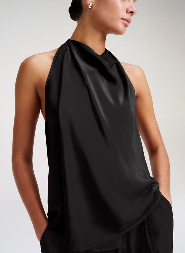 woman wearing black halter top
