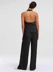 woman wearing black halter top and black pants
