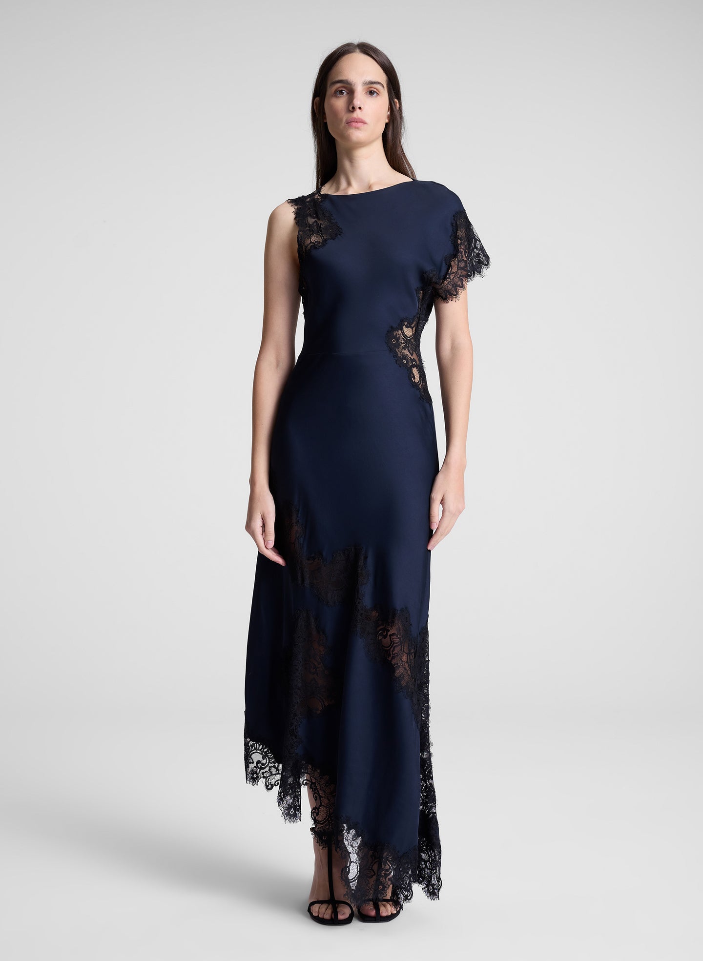 woman wearing navy blue lace trim maxi dress