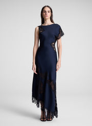 woman wearing navy blue lace trim maxi dress
