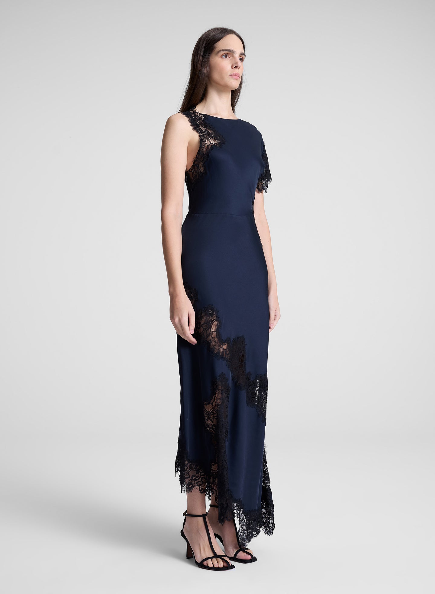woman wearing navy blue lace trim maxi dress