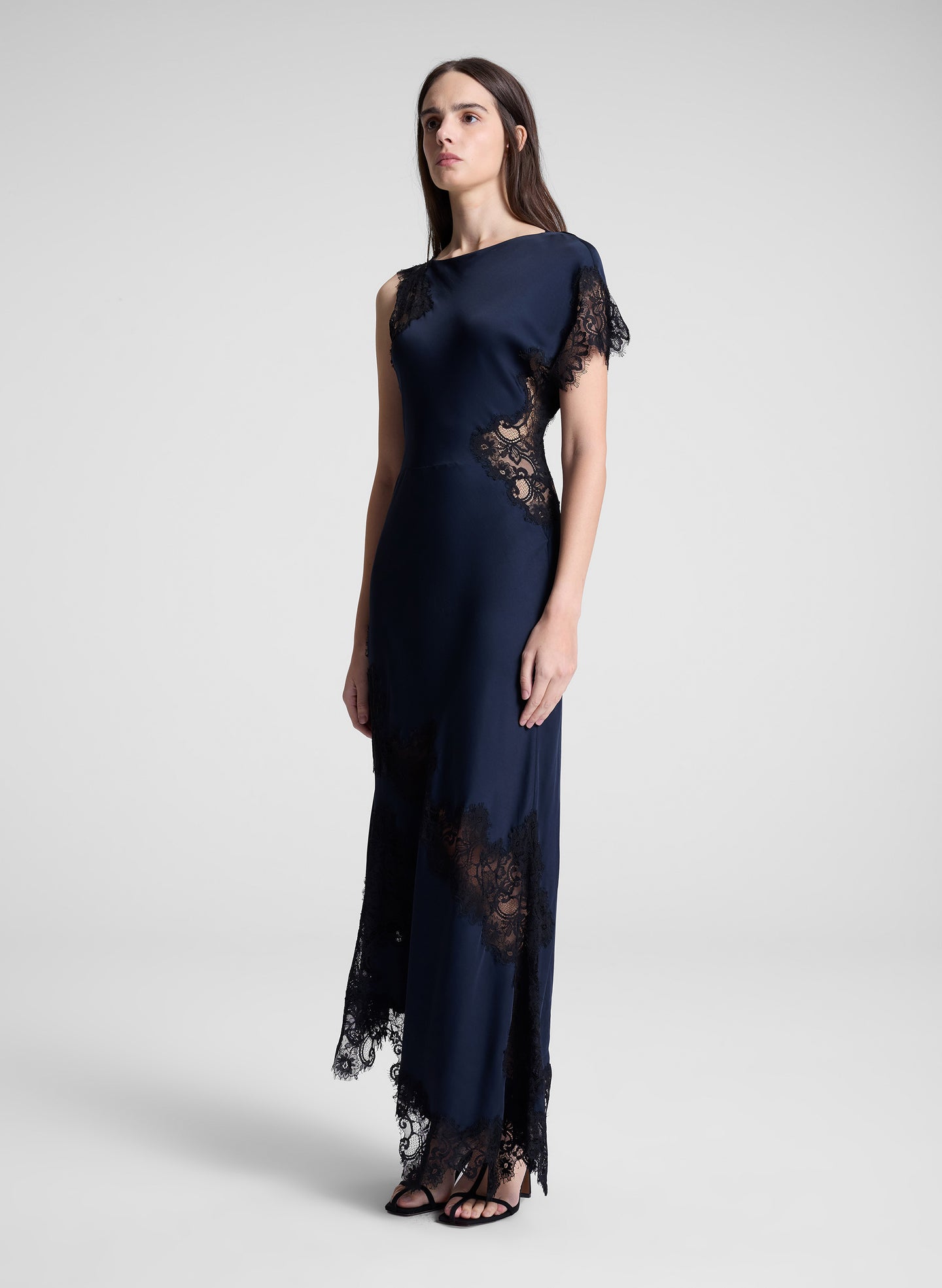 woman wearing navy blue lace trim maxi dress