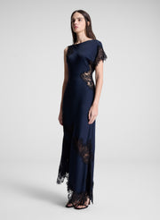 woman wearing navy blue lace trim maxi dress