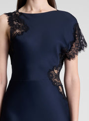 woman wearing navy blue lace trim maxi dress