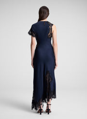 woman wearing navy blue lace trim maxi dress