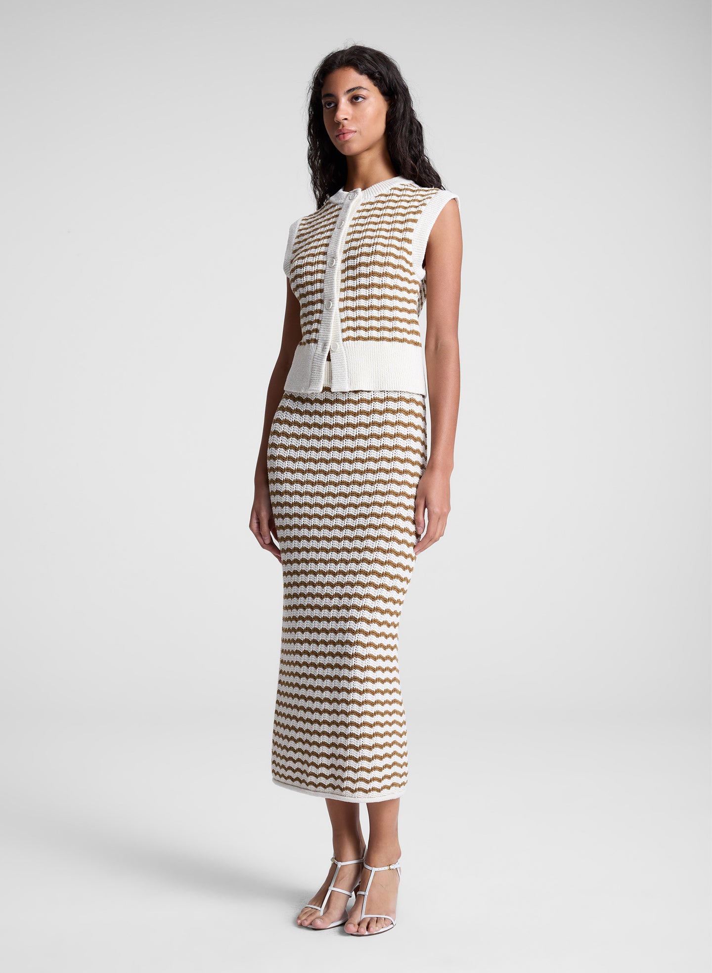 woman wearing striped knit skirt and shirt set