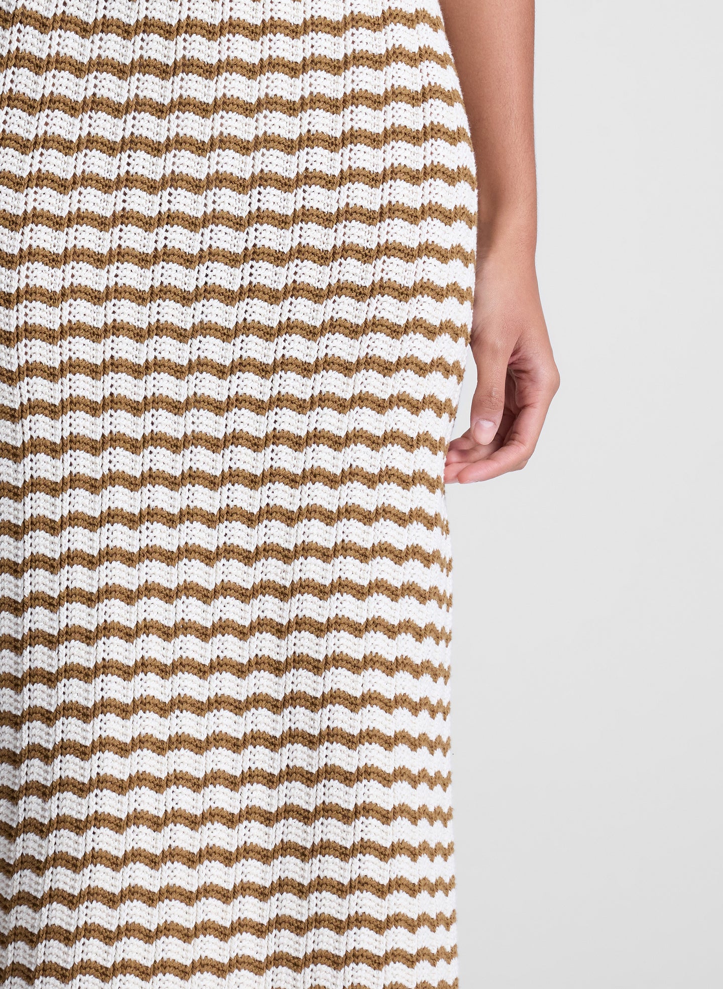 woman wearing striped knit skirt and shirt set