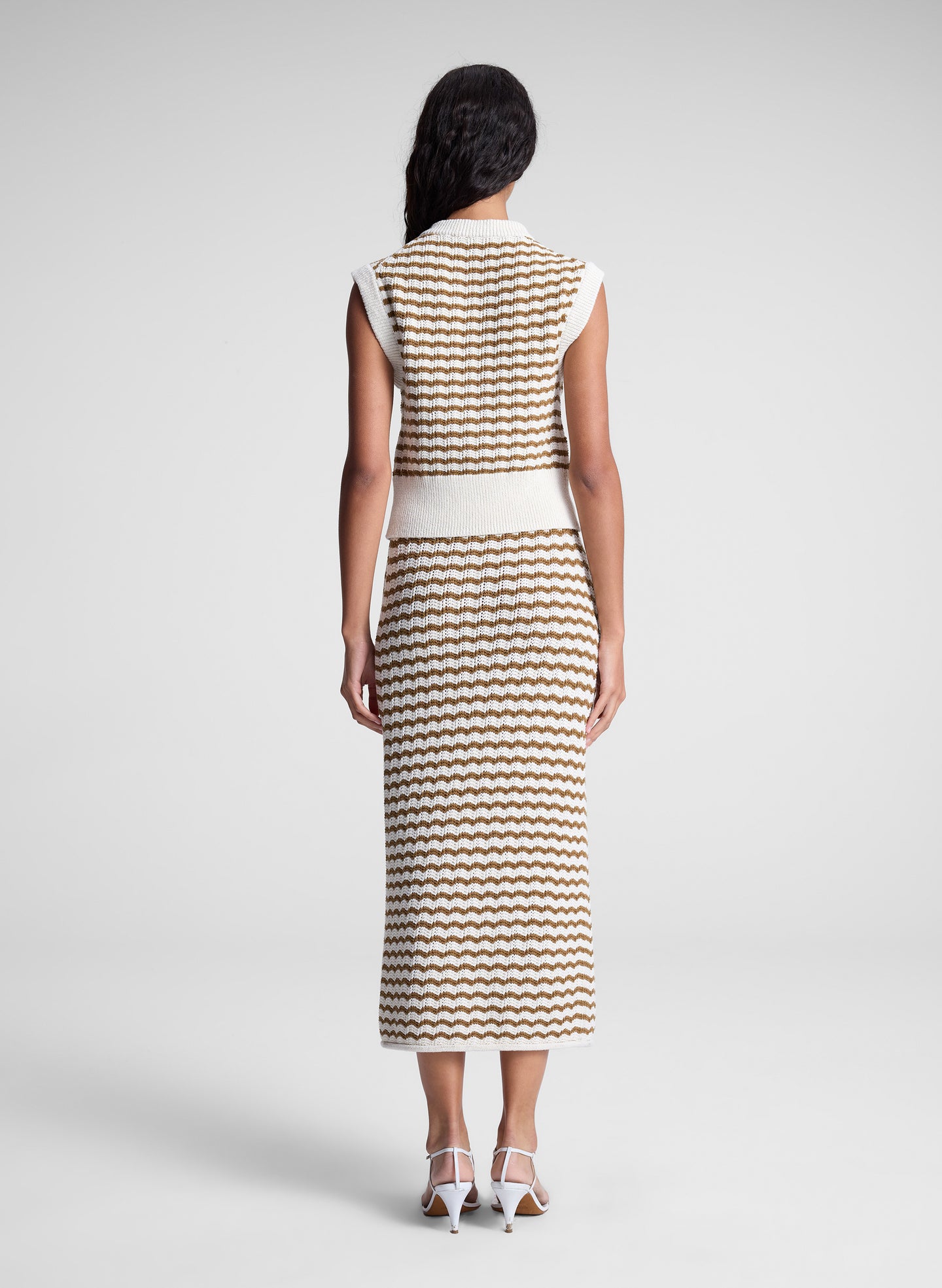 woman wearing striped knit skirt and shirt set