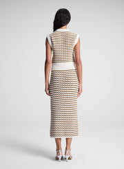 woman wearing striped knit skirt and shirt set