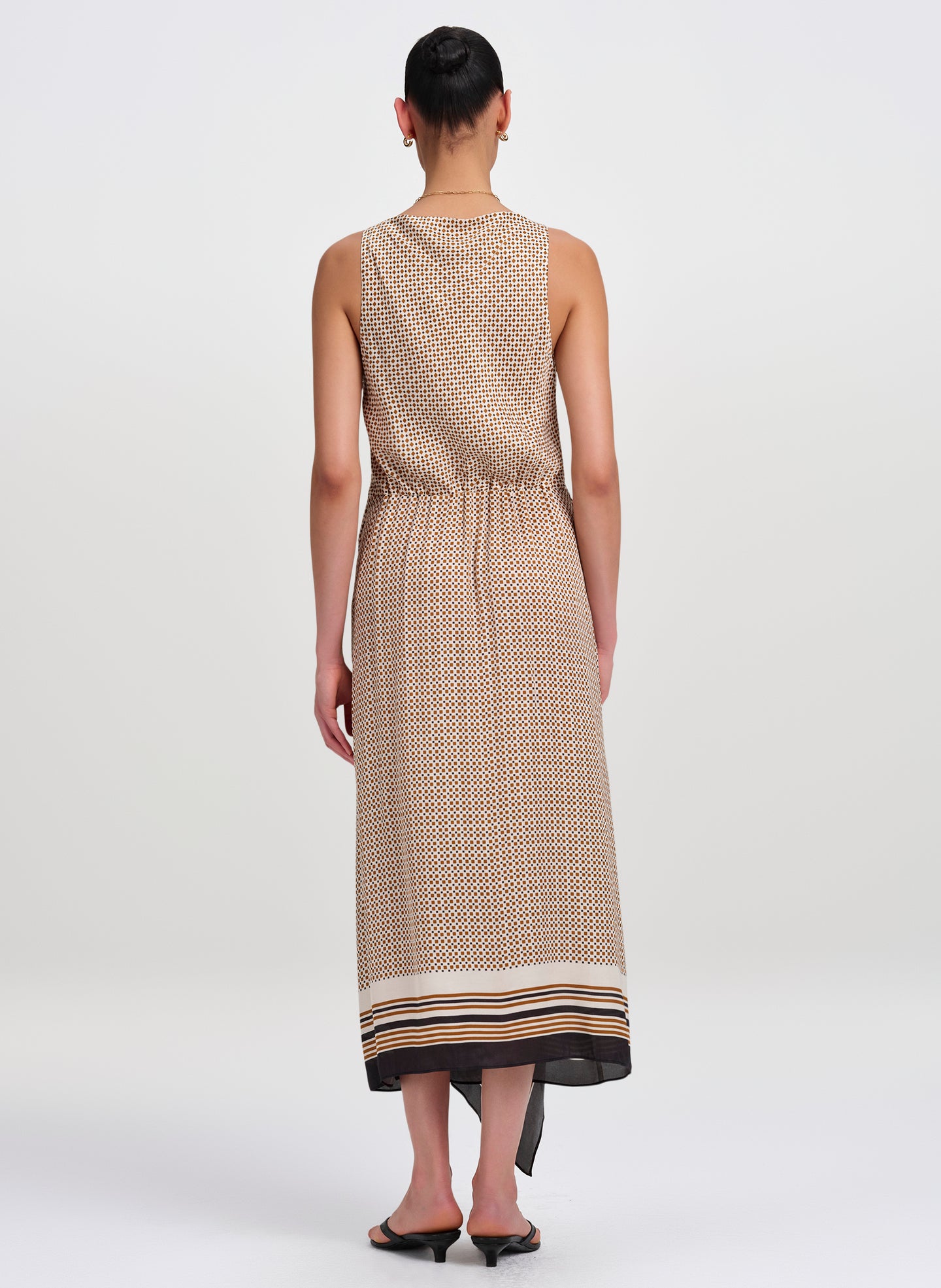 woman wearing scarf print midi dress