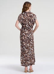 woman in brown print midi dress