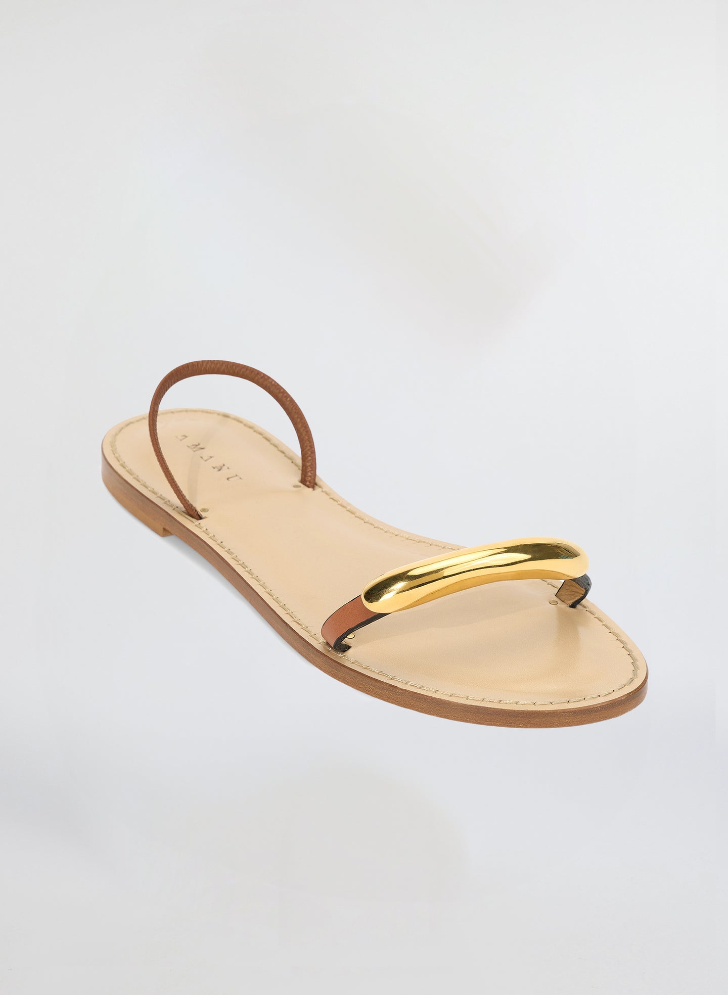 brown sandal with gold plated accent