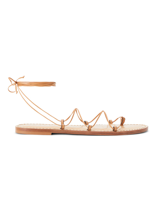 side view of a tan sandal with tan wrap strings