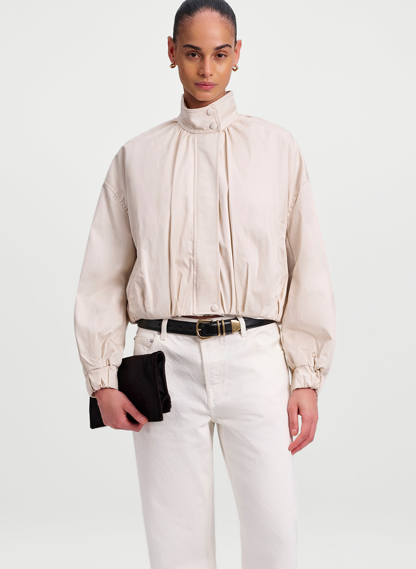 woman wearing off white jacket