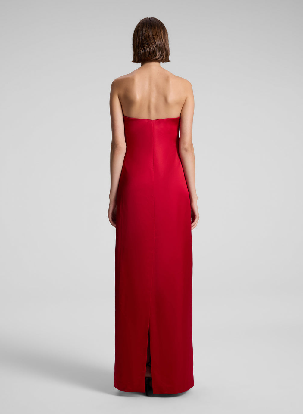 woman wearing red strapless gown