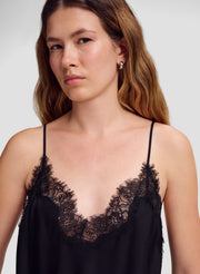close up of model in black lace trim camisole top