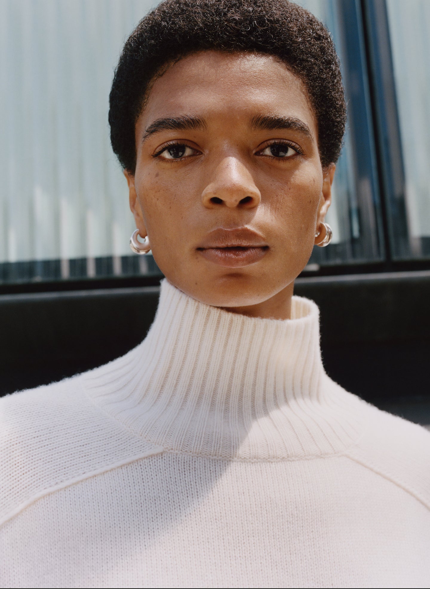 woman wearing white sweater