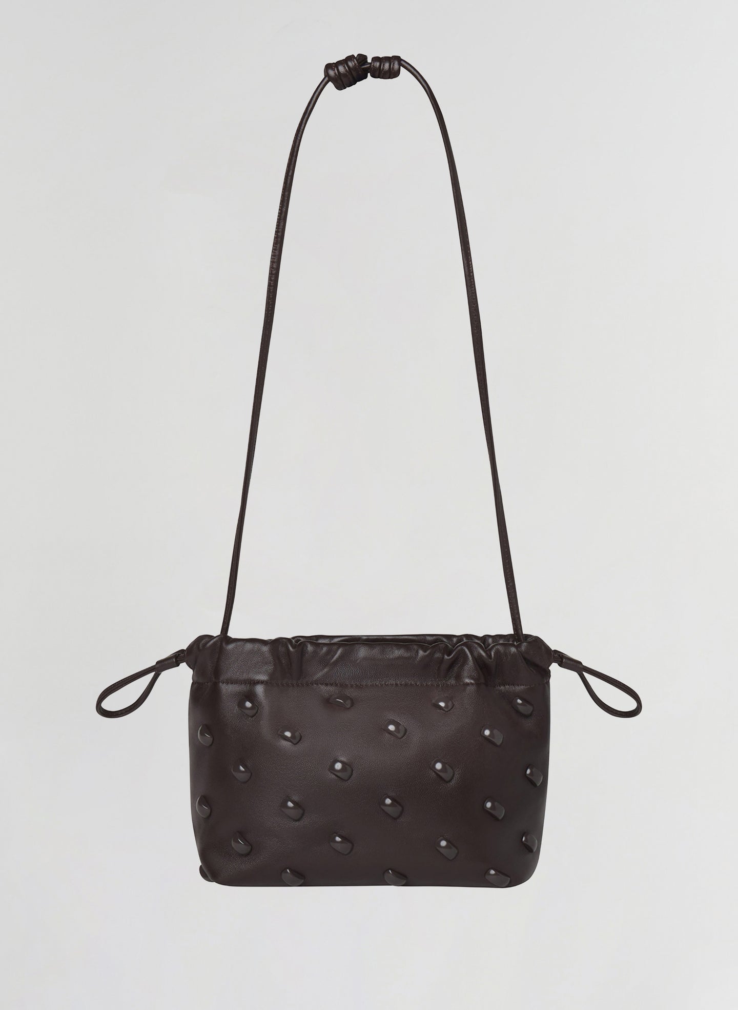 brown studded leather handbag