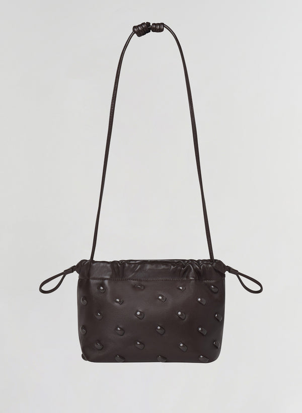 brown studded leather handbag
