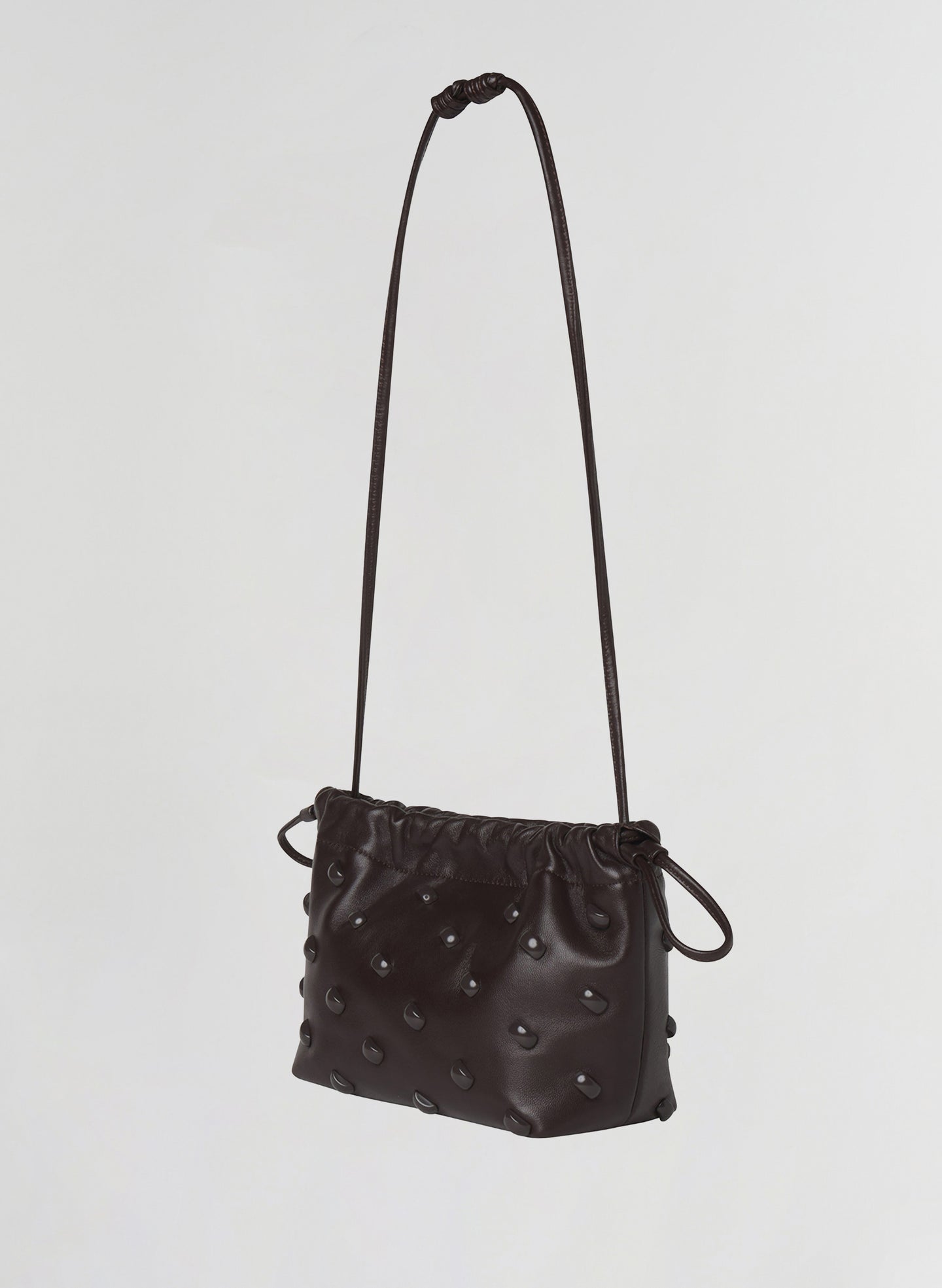 brown studded leather handbag