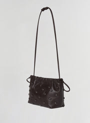 brown studded leather handbag