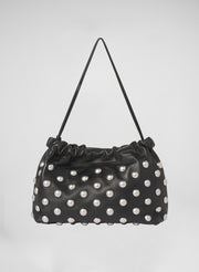 photo of black studded handbag