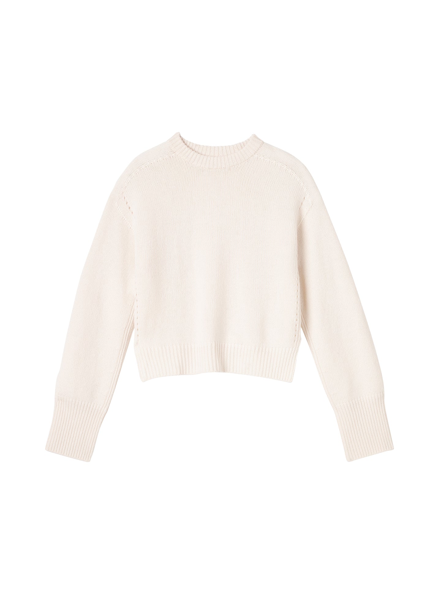 flatlay of white sweater