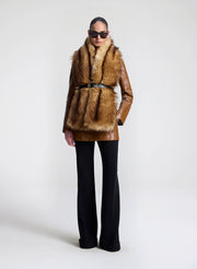 woman wearing faux fur scarf with belt and jacket