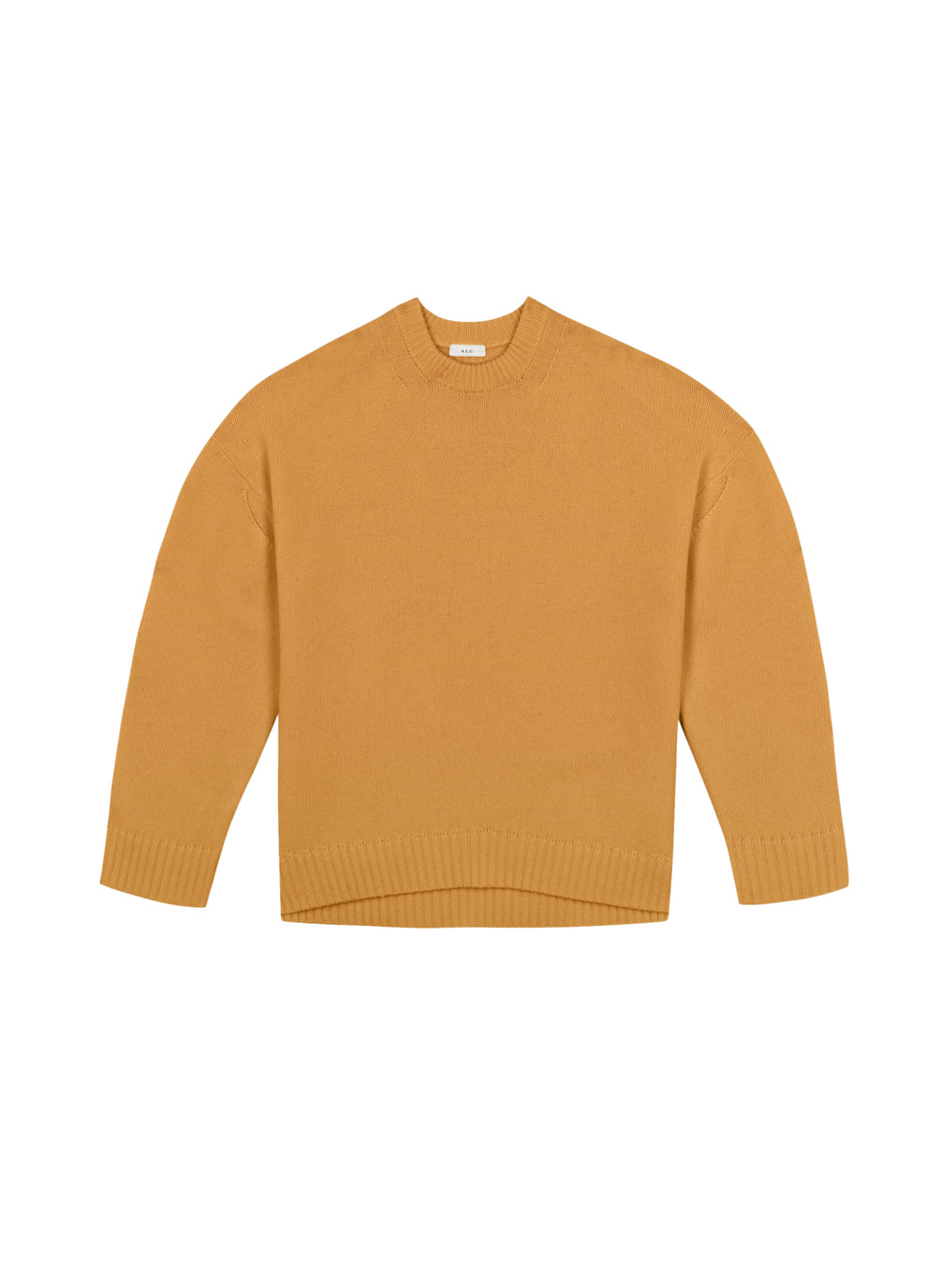 flat lay view of woman wearing tan cashmere long sleeve sweater